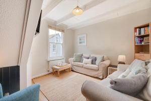 a living room with two couches and a tv at 3 Bed in St. Ives oc-marhou in St Ives
