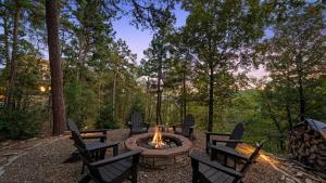 a fire pit in the middle of a yard at New Unbelievable Views Gourmet Kitchen Firepit in Broken Bow
