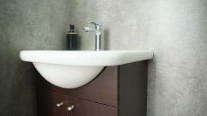 a white sink on a cabinet in a bathroom at Ecos de Mar Refugios in Puerto Pirámides