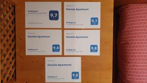 a wall with signs that say dreddpatient and dredd participant at Daniela Apartment in Cortina dʼAmpezzo