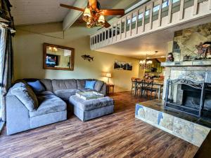a living room with a couch and a fireplace at Snow Summit Townhouse Unit 69 in Big Bear Lake