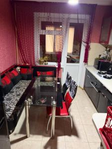 a living room with a couch and a table at City Relax in Bălţi