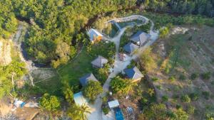 an aerial view of a house with a road at Thiên Vy Homestay in Phú Quốc +9 photos