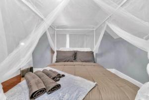 a bedroom with a bed in a tent at Cozy Corner Buffalo Getaway in Buffalo