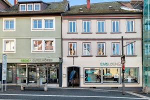 a row of buildings on a street at INhome - Zentral - Küche - Modern in Schwäbisch Hall