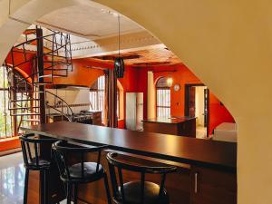 a dining room with a table and chairs at Villa Media in Kigali