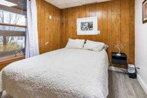 a bedroom with a bed and a window at Spacious 2BR Apt • Free Parking • Baden in Baden