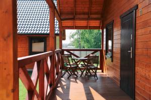 Balkon lub taras w obiekcie Rozewska Bliza Domki Letniskowe