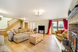 a living room with a couch and a table at 5 Bed in Langport oc-h33495 in Langport