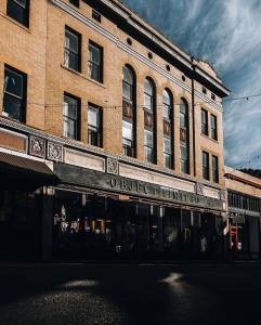 an old brick building with the words oberrett limited at Object Hotel 1BR Shared Bath Room 2D in Bisbee