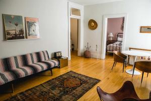 a living room with a couch and a table at Object Hotel 2BR Room 2G in Bisbee