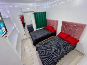a living room with a couch and a chair at casa renta vacacional en mazatlan in Mazatlán