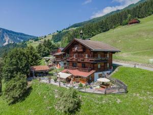 an overhead view of a large house on a hill at Poschen in Wald im Pinzgau