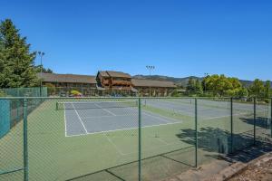 a tennis court with two tennis courts at Stoneridge Resort in Blanchard