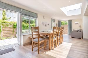 a dining room with a table and chairs at 4 Bed in Aldeburgh oc-16faw in Aldeburgh