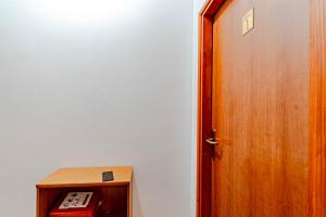 a door to a room with a phone next to it at Apartments and rooms with WiFi Lastovo - 13678 in Lastovo