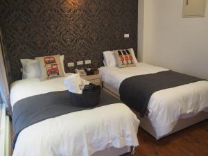 Postel nebo postele na pokoji v ubytování Successful 168 B&B