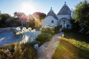Vonkajšia záhrada v ubytovaní Leonardo Trulli Resort