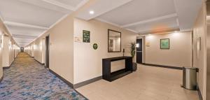 a hallway of a hospital with a hallway at B&B Hotel Miami Airport in Miami