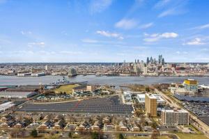 an aerial view of a city and a river at Riverside Retreat in Camden