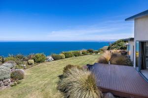 a view of the ocean from a house at Oceanview Haven B&B in Dunedin +7 photos