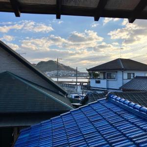 a view from the roof of a building with roofs at イマヅのかくれ家 in Fukuoka