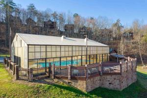 a large building with a swimming pool in it at Joy's Retreat Cabin in Sevierville