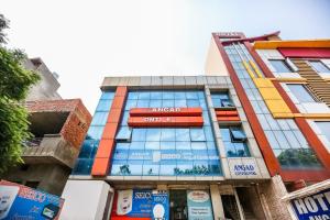 a building with a sign on the front of it at Hotel O by OYO Angad Continental in Ambāla