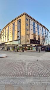 a large building with a lot of windows at 2 Spacious Double Bedroom Apartment - Bradford in Bradford