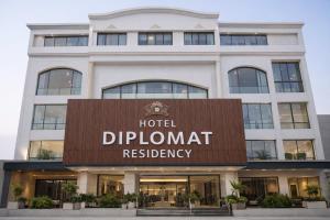a building with a hotel plymouth restaurant headquarters at Hotel Diplomat Residency in Bareilly