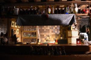 a bar with a tiled counter in a restaurant at Pam Hill in Bản Pha Xum +26 photos
