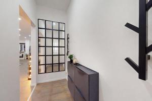 a living room with a tv on a wall at Wohnung mit Heimkino mitten in der Altstadt in Celle
