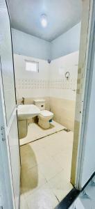 a bathroom with a toilet and a sink at Aamy Luxury Villa in Galle +21 photos