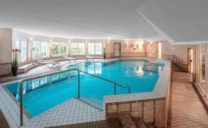 a large swimming pool in a hotel at Dorint Strandresort & Spa Westerland/Sylt in Westerland