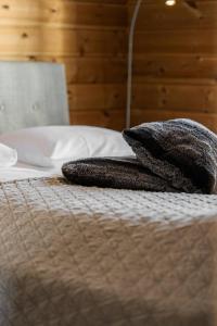 two pillows sitting on top of a bed at Solsiden 16B by Vacation Trysil in Trysil +25 photos