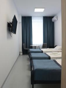 Et tv og/eller underholdning på Impuls Prof Hotel