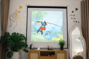 a painting of a man with a dog on the wall at Mèn Mén Home in Phú Thọ