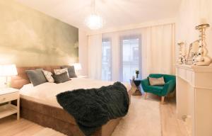 Posteľ alebo postele v izbe v ubytovaní Kings City - Skawińska Apartment
