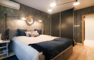 Posteľ alebo postele v izbe v ubytovaní Kings City - Skawińska Apartment