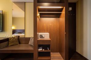 a room with a door with a microwave on it at AR Golden House II in Košice