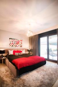 Postel nebo postele na pokoji v ubytování Kings City - Skawińska Apartment