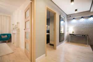 Posteľ alebo postele v izbe v ubytovaní Kings City - Skawińska Apartment