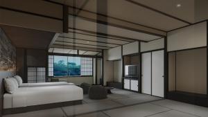 a bedroom with a white bed and a television at Gensen Itto Minamiizu in Minamiizu +17 photos