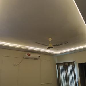 a ceiling with a ceiling fan in a room at Wali Rest House 1 in Rahimyar Khan