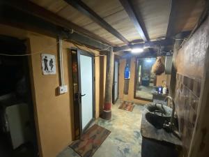 a bathroom with a sink and a mirror at Pam Hill in Bản Pha Xum