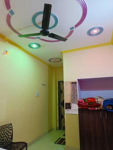a room with a ceiling with a ceiling fan at HOTEL DEVDOOT in Rājgīr
