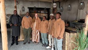 a group of people posing for a picture at Meru Nest Arusha in Arusha