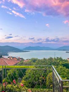 a view of a body of water from a balcony at Villa Ametista in Meina