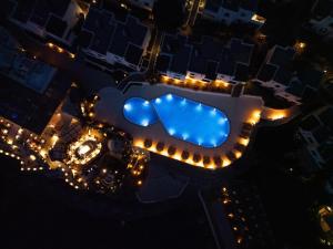 an overhead view of a swimming pool at night at YAZ Yalıkavak in Yalıkavak