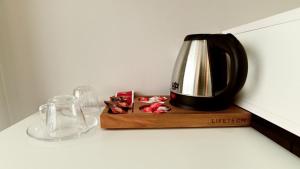 a coffee maker sitting on top of a counter at Lizbonia Suit Otel in Istanbul